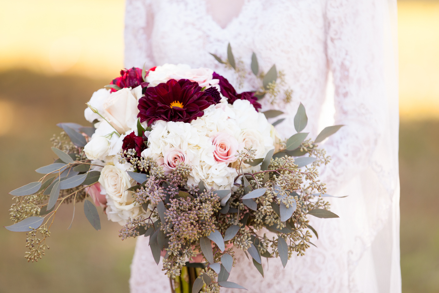 Angie's Catering and Floral Design - Columbus, Mississippi - Bride holding bouquet